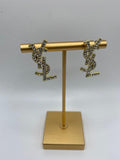BEAUT`E  DIAMOND (Gold based "YSL" earring covered in diamonds )